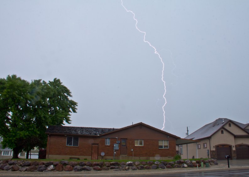 photograph lighting bolt in daylight