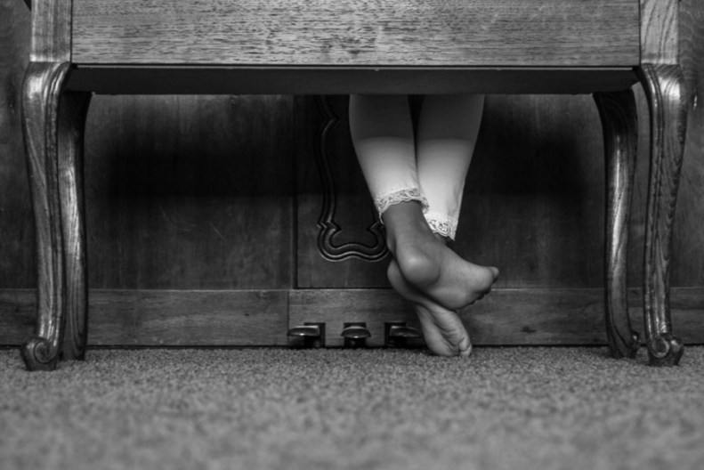 Little lady at the piano black and white photograph little lady at piano
