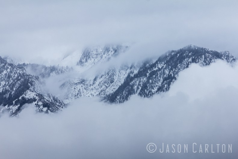 photo Lone Peak covered Winter Clouds